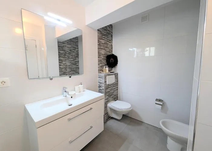 Апартаменти Sun Relax Urbania Адехе